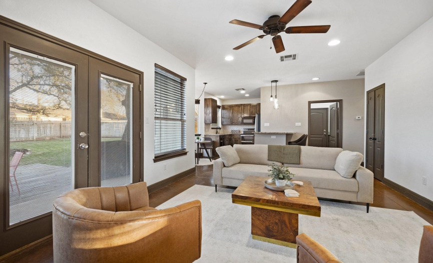Enjoy effortless flow between the family room and eat-in kitchen, perfect for casual gatherings and everyday living.