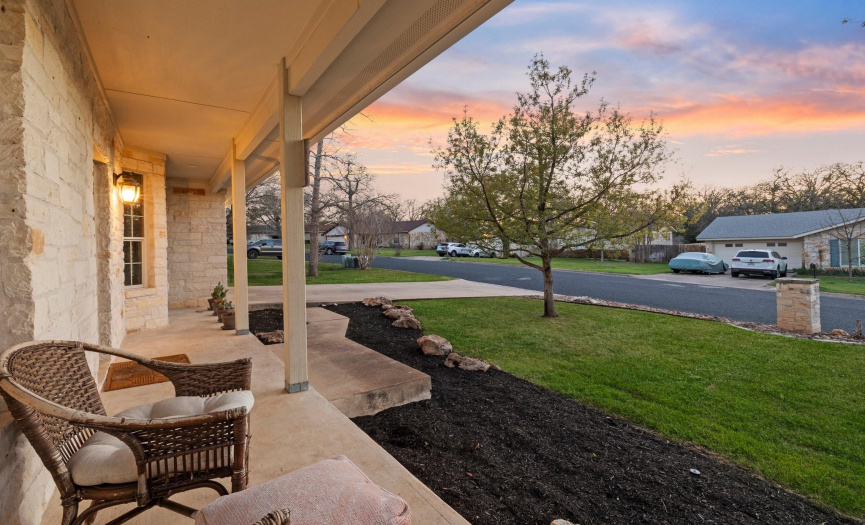 Welcome guests to the charming covered front porch, providing a warm and inviting entrance to the home.