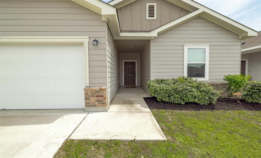 From the moment you arrive, the charming curb appeal and manicured landscaping welcome you home.