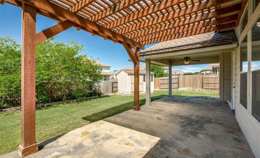 Pergola covered extended rock patio