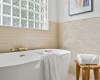 Enjoy a relaxing bath in this large soaking tub.