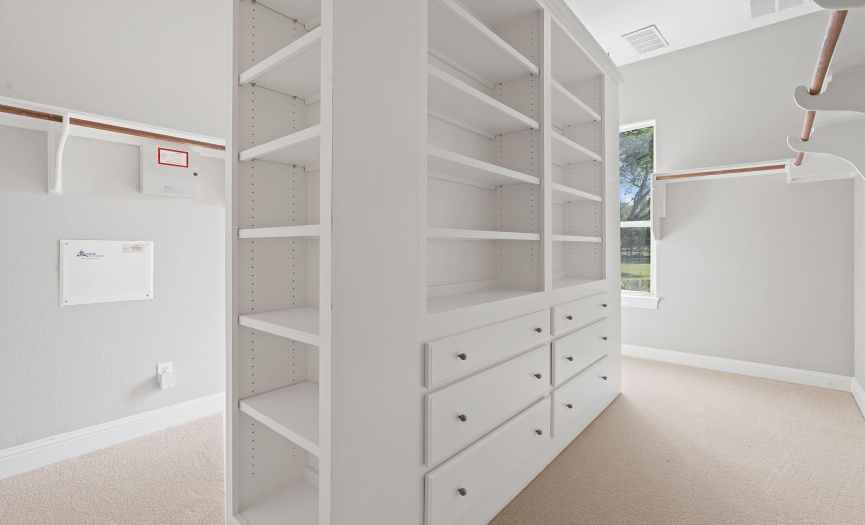 Primary closet with built-ins.