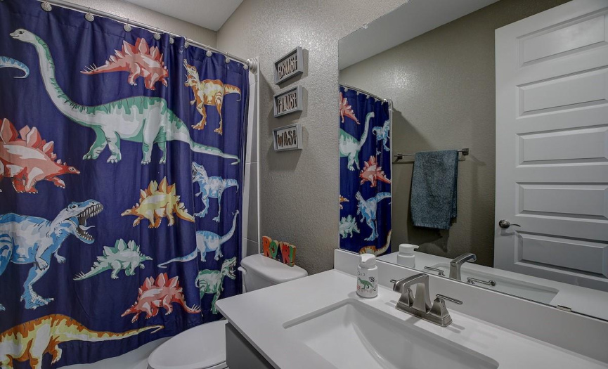Bathroom # 2 is between bedroom 2 & 3. Tub Shower combo w/gorgous quartz counter