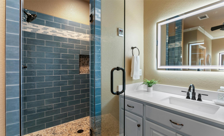 Walk-in shower remodeled in March 2024.