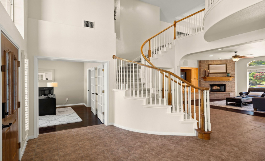 Front door greets you with a formal dinning and private office on either side of the entry.