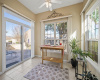 The sun room provides an additional living space where you can relax and enjoy the sunny view.