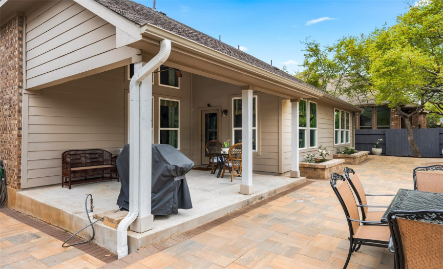 The covered back porch extends your living space outdoors and offers an overhead fan and a gas hookup for your grill. 
