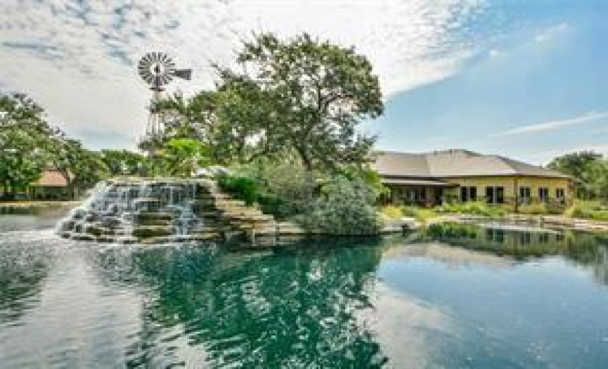 Heritage Oaks clubhouse and signature pond and waterfall.