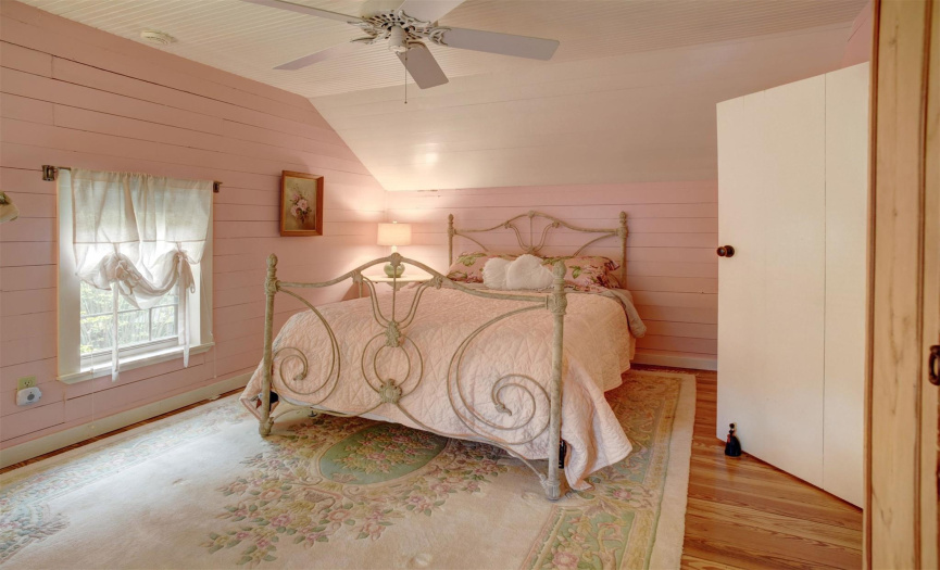 Upstairs bedroom in historic wing