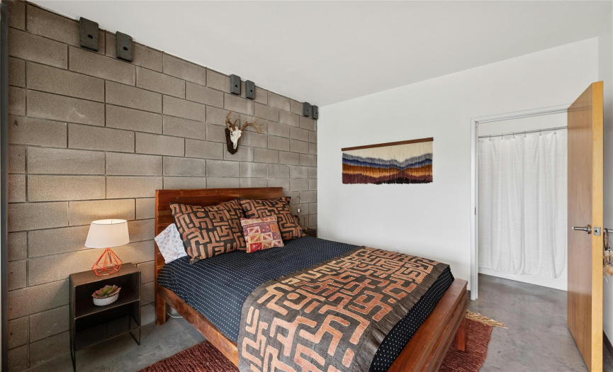 Attached to this bedroom is a large closet and ensuite bathroom with tub and shower combo