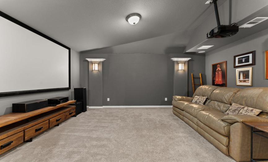Upstairs media room with equipment to convey.