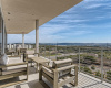 There is a large balcony with panoramic views of Lake Travis