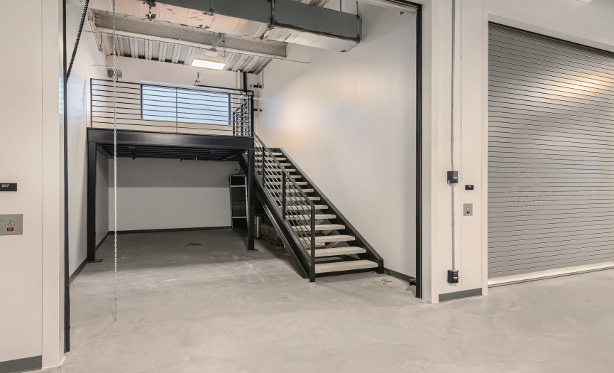  This versatile unit is located on the 2nd floor and features 450 sq ft of commercial condo space. The lower level is 301 sq ft, while the upper mezzanine level is 149 sq ft
