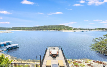 Enjoy watching the sunset on your lakeside deck, overlooking the boat dock