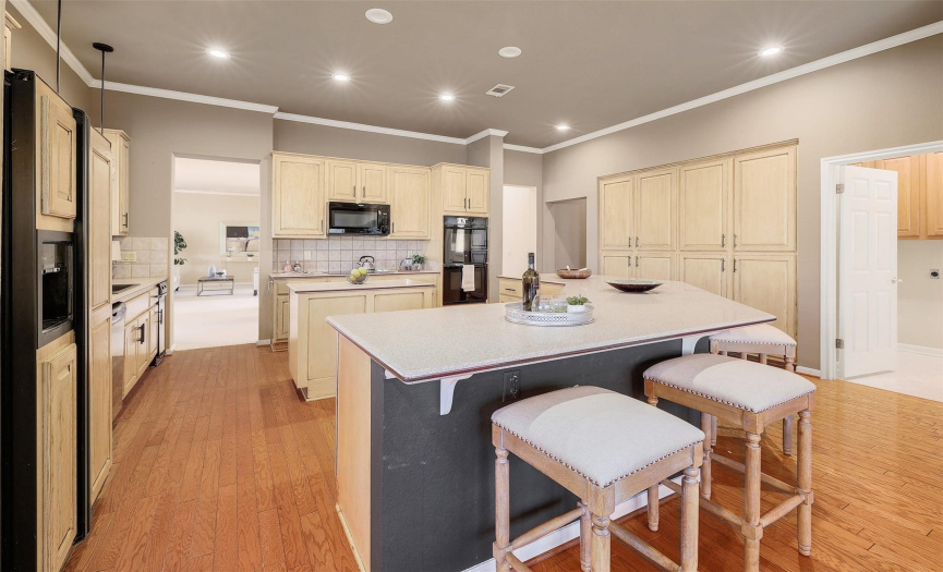 With its spacious layout and ample counter space, this kitchen is a chef's dream, perfect for preparing delicious meals and entertaining guests.