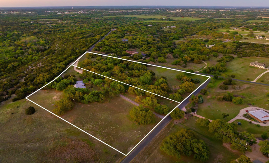 5.27 acre tract with the home is the left outlined property. 
