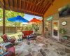 Plenty of space for  your patio furniture and to enjoy the big game on your outdoor TV.