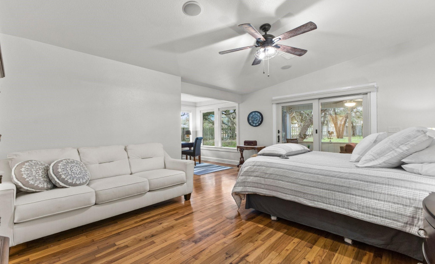 Master bedroom features a sitting area that views the treed yard!