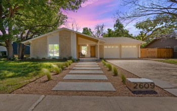 A Masterfully redesigned Organic Midcentury Contemporary home in the heart of 78745. 