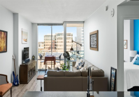 Natural light floods the whole condo with floor to ceiling windows throughout