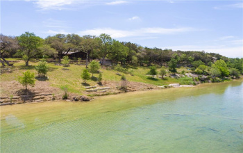 Have you ever been driving down River Road and wanted to jump in the Blanco?  Here is your chance. Home sits on the easy slope for access to a deep Blanco River spot for floating, kayaking, paddle boarding and swimming.