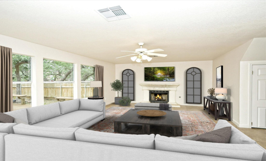 Virtually staged as a comfortable space for family and friends.