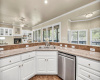 Bright kitchen with views of the outdoors, great room and breakfast nook