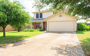 In Post Oak, 2 story home with 2 living areas, fenced yard with playscape.
