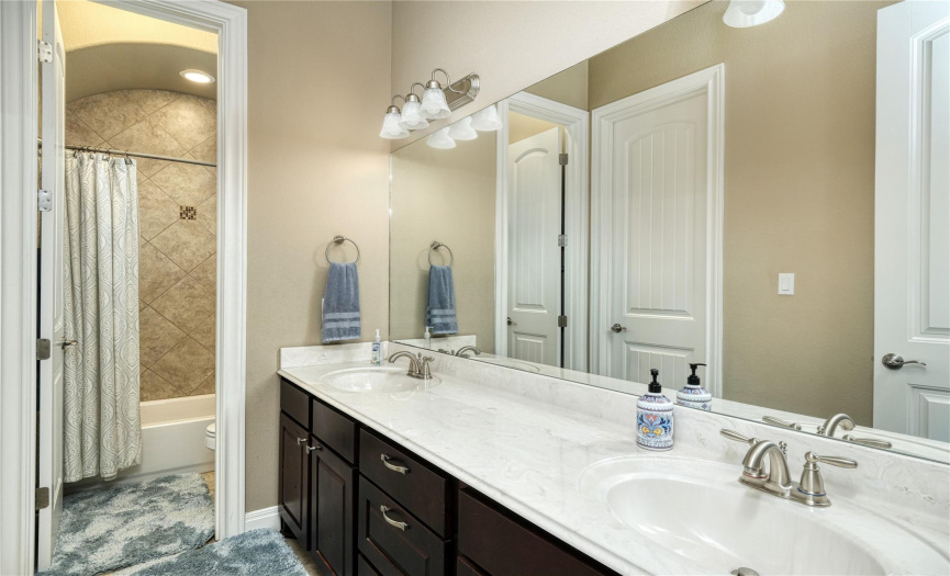 bathroom, double vanity, tub/shower combo