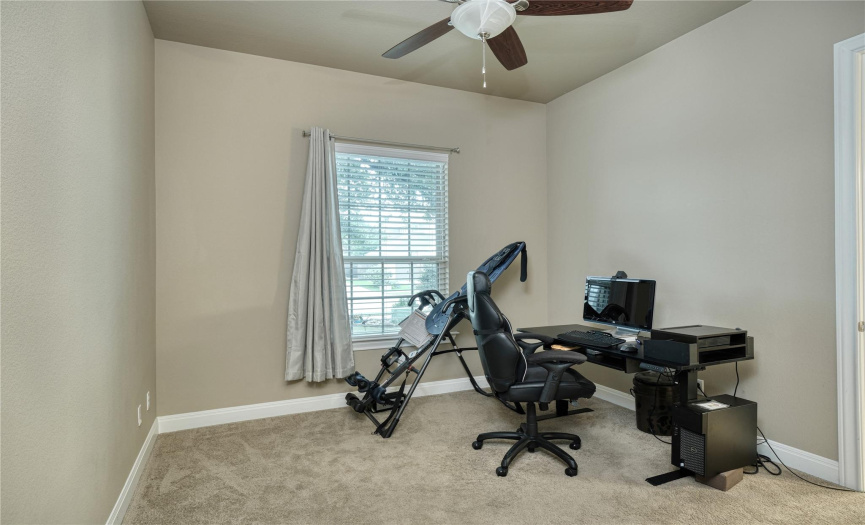 secondary bedroom, ceiling fan, carpet