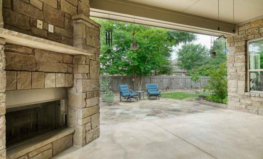 backyard, covered patio, fireplace