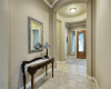 entry way, high ceilings and tile floor