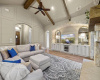 Wood beams and a vaulted ceiling give this home an elegant touch. 