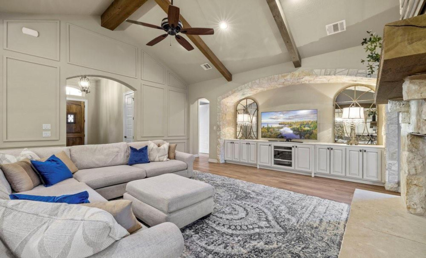 Wood beams and a vaulted ceiling give this home an elegant touch. 