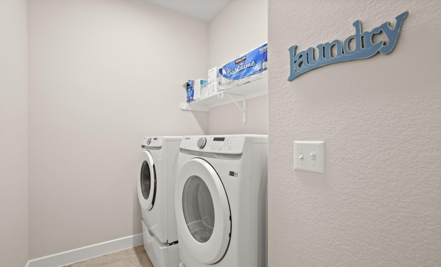 Enjoy the convenience of a dedicated laundry area, equipped with modern appliances and ample storage space to streamline your household chores.