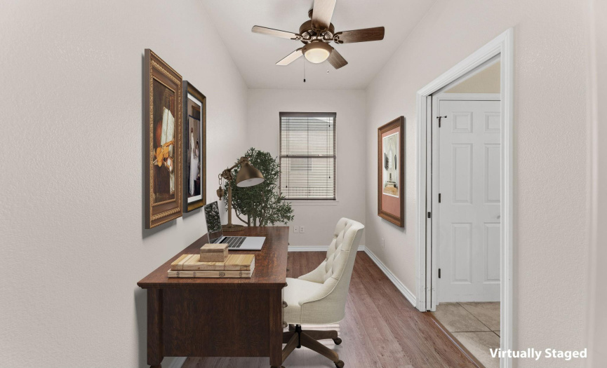 Comfortable Office space located off the Primary suite - Photo is virtually staged
