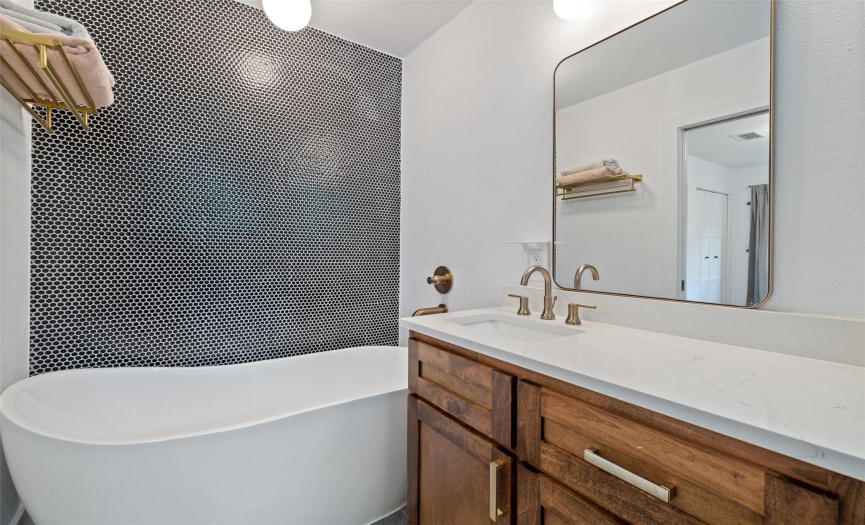 Primary bath with tasteful updates! Gorgeous soaking tub and huge walk-in shower!