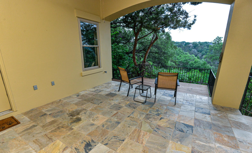 The LOVE the slate stone floor on the COVERED BACK PATIO helps prevent slips - even if it gets wet. 