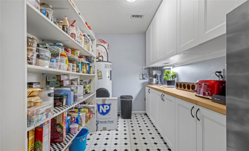 Pantry has some custom built-ins that were added to increase storage.
