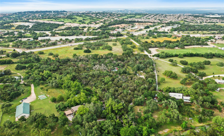 View from back of property looking towards Hamilton Pool and Highway 71 with the LTYA Field of Dreams (soccer) on the right.