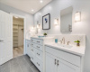 The master bath features custom cabinetry