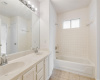 Primary Bathroom - The main bathroom boasts dual vanities.