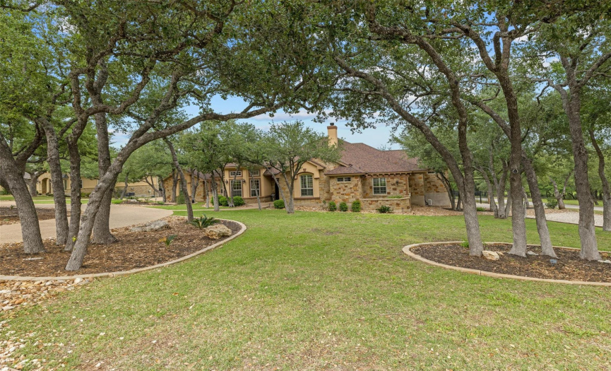 There are over 70 live oak trees on this oversized acre+ lot! The front and back yards have automatic sprinklers.
