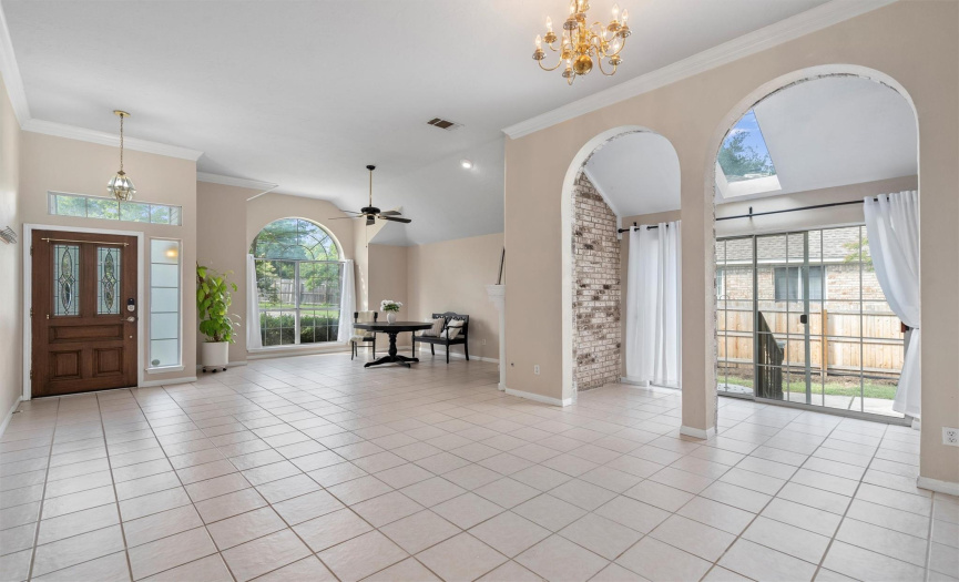 Upon entering the home, you are greeted by a spacious and bright room that opens up so many possibilities... music room, art room, sitting area, dining room...