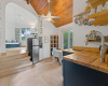 Casita kitchen up to the living area with treehouse views