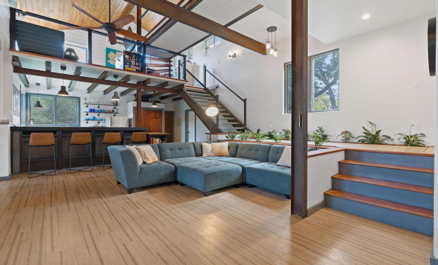 Open concept living with an upstairs loft