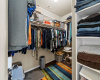 Oversized primary closet has room for everything! 