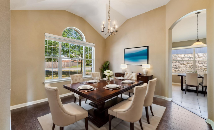 The formal dining room exudes sophistication, offering a refined space for hosting dinner parties and special occasions, elevating your dining experience.