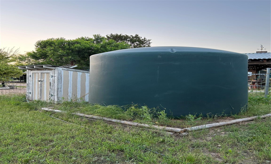 Well house and water storage tank