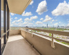 The corner balcony with views over Northwest and Southwest Houston. It is accessed through the dining area.